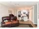 Open-concept features view of kitchen, island with bar seating, and living room at 8711 Plum Ln, Temple Terrace, FL 33637