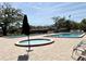 Community pools include jacuzzi and chaise lounges around the perimeter at 8711 Plum Ln, Temple Terrace, FL 33637