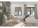 Cozy living room featuring neutral furnishings, stylish decor, and ample natural light at 10086 Hilltop Dr, New Port Richey, FL 34654