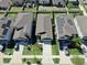 Aerial view showcasing neat rows of homes with well-kept lawns and driveways in a suburban setting at 10205 Cool Waterlily Ave, Riverview, FL 33578