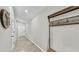 Inviting entryway featuring tile floors, neutral walls, and modern decor at 10205 Cool Waterlily Ave, Riverview, FL 33578