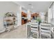 Open concept kitchen with wood cabinets and dining area at 10205 Cool Waterlily Ave, Riverview, FL 33578