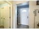 Entryway featuring tile floors, and a view of a hallway at 10352 Lansfield St, Spring Hill, FL 34608