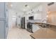 Well-equipped kitchen featuring stainless steel appliances, subway tile backsplash and ample counter space at 129 Treviso Ct, North Venice, FL 34275