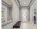 Elegant entryway featuring a bench, mirror, tiled flooring, and glass-paneled doors at 14123 Barrington Stowers Dr, Lithia, FL 33547