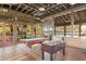 Entertaining game room with pool table and foosball, offering a fun recreational space for residents at 14123 Barrington Stowers Dr, Lithia, FL 33547