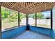 Screened in porch showing a view of the backyard and storage shed at 2035 Ronald Cir, Seffner, FL 33584