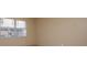 Bright bedroom featuring large windows that offer natural light and views of the surrounding area at 2440 Enterprise Rd # 2, Clearwater, FL 33763