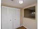 Hall Closet with functional shelving and convenient access from kitchen area at 2440 Enterprise Rd # 2, Clearwater, FL 33763