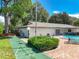 Community with a pool, shuffleboard, and other outdoor activities for residents to enjoy at 2440 Enterprise Rd # 2, Clearwater, FL 33763