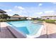 Inviting community pool surrounded by lounging areas, perfect for relaxation and recreation at 2440 Enterprise Rd # 2, Clearwater, FL 33763