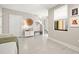 Welcoming entryway featuring neutral tones, a bench, and a view of the staircase at 2570 12Th N Pl, St Petersburg, FL 33713