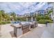 Outdoor grilling station in a community area, with a pool, seating and landscaping at 2570 12Th N Pl, St Petersburg, FL 33713