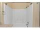 Clean white shower and tub with updated fixtures at 2730 Via Tivoli # 321B, Clearwater, FL 33764