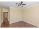 Bright bedroom with wood floors and neutral colored walls at 2730 Via Tivoli # 321B, Clearwater, FL 33764