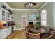 Bright breakfast nook featuring granite counters, a wine cooler, and a quaint breakfast table at 2730 Via Tivoli # 321B, Clearwater, FL 33764