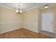Cozy dining room featuring hardwood floors and neutral colors at 2730 Via Tivoli # 321B, Clearwater, FL 33764