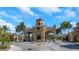 Community gate, showing off the beautiful landscaping and architectural design at 2730 Via Tivoli # 321B, Clearwater, FL 33764