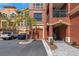 Beautiful condominium building with a private garage and palm trees in a well-maintained community at 2730 Via Tivoli # 321B, Clearwater, FL 33764
