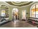 Bright gym features various weight machines, free weights, and mirrors for a complete workout experience at 2730 Via Tivoli # 321B, Clearwater, FL 33764