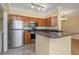 Modern kitchen featuring stainless steel appliances and sleek granite countertops offers a stylish design at 2730 Via Tivoli # 321B, Clearwater, FL 33764