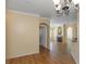 Open living area with seamless flow between dining room, living room with fireplace, and modern kitchen at 2730 Via Tivoli # 321B, Clearwater, FL 33764