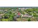 Aerial view of a home with a pool, mature trees, and a spacious yard in a quiet, established neighborhood at 2905 Hillside Ramble Dr, Brandon, FL 33511