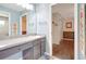 Comfortable, shared bathroom with dual sinks, and generous counterspace at 2905 Hillside Ramble Dr, Brandon, FL 33511