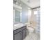 Cozy bathroom with a combined shower-tub and ample storage under the sink at 2905 Hillside Ramble Dr, Brandon, FL 33511