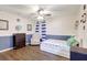 Stylish bedroom with charming nautical decor and modern furniture at 2905 Hillside Ramble Dr, Brandon, FL 33511