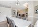 Stylish dining area with a modern chandelier, open layout, and seamless transition to the living space at 2905 Hillside Ramble Dr, Brandon, FL 33511