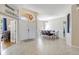 Welcoming foyer with tile flooring, arched entryways, and a clear view of the adjacent dining area at 2905 Hillside Ramble Dr, Brandon, FL 33511