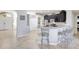 Open living room with bar seating, perfect for entertaining at 2905 Hillside Ramble Dr, Brandon, FL 33511