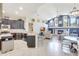 Bright living room features a cozy fireplace, large windows, and an open floor plan at 2905 Hillside Ramble Dr, Brandon, FL 33511