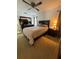 Bedroom with a ceiling fan, carpet, and an ample amount of sunlight coming from the window at 3120 Dole St, Holiday, FL 34691