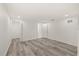Spacious bedroom with neutral walls, wood floors, and ample closet space at 3249 Masonville Loop, Holiday, FL 34691