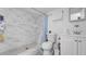 Remodeled bathroom with modern vanity, toilet, and tiled walk-in shower at 3276 Morven Dr, Spring Hill, FL 34609