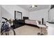Bedroom with neutral tones, a ceiling fan, tile floor, and natural light at 3276 Morven Dr, Spring Hill, FL 34609