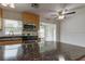 Modern kitchen with sleek appliances, marble countertops, and views into the living area at 337 Shore E Dr, Oldsmar, FL 34677