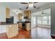 Spacious kitchen next to dining area, featuring modern appliances and ample cabinet storage at 337 Shore E Dr, Oldsmar, FL 34677