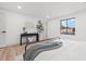 Clean and bright bedroom with minimalist decor and plenty of natural light at 398 Walnut Ct, Palm Harbor, FL 34683