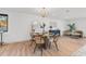 Inviting dining area featuring a modern table, stylish chairs, and contemporary décor at 398 Walnut Ct, Palm Harbor, FL 34683