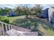 Lawn view showing a building, large shade tree, and landscaped green space at 4004 Cortez Dr # D, Tampa, FL 33614