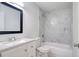 Modern bathroom featuring a bathtub, marble tile shower, and vanity with a sink at 4004 Cortez Dr # D, Tampa, FL 33614