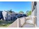 Exterior view from a porch, showing well-maintained building exteriors and green spaces at 4004 Cortez Dr # D, Tampa, FL 33614