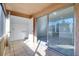 Enclosed patio features tile floors, storage and a sliding glass door to the living space at 4004 Cortez Dr # D, Tampa, FL 33614