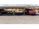 Assigned covered parking featuring ample space for multiple vehicles at 401 Dorchester Pl # 55, Sun City Center, FL 33573
