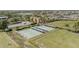 Well-maintained shuffleboard courts with covered seating and beautifully landscaped grounds at 401 Dorchester Pl # 55, Sun City Center, FL 33573