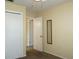 A carpeted bedroom with two closets is a versatile and functional living space at 4338 Tahitian Gardens Cir # H, Holiday, FL 34691