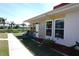 Waterfront condo with a lovely front patio, perfect for enjoying tranquil views and outdoor seating at 4338 Tahitian Gardens Cir # H, Holiday, FL 34691